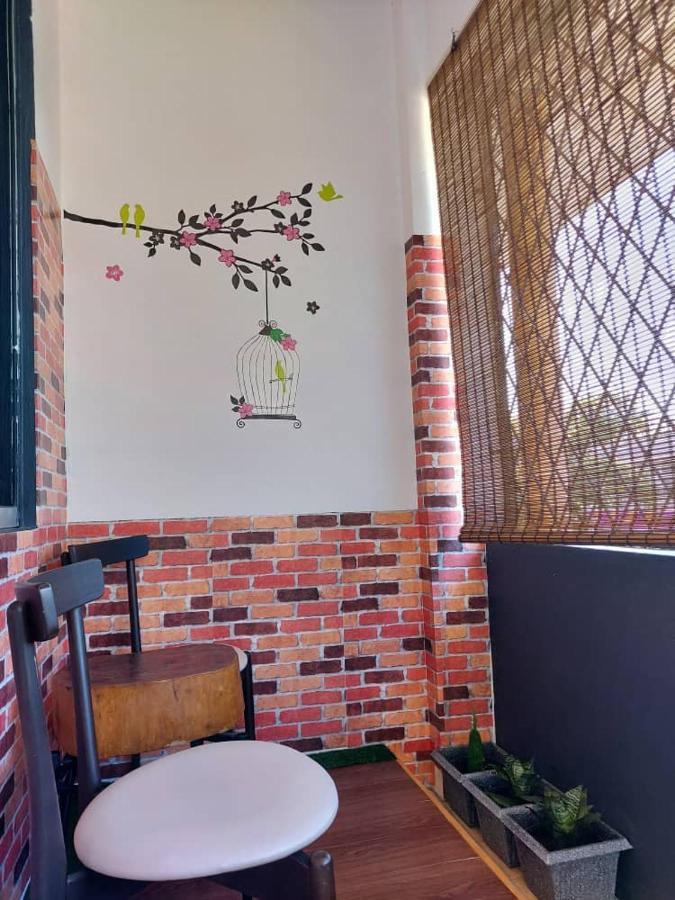 Karya Story Hostel Кудат Экстерьер фото